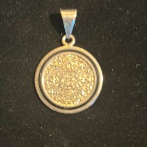 Sterling silver disc pendant